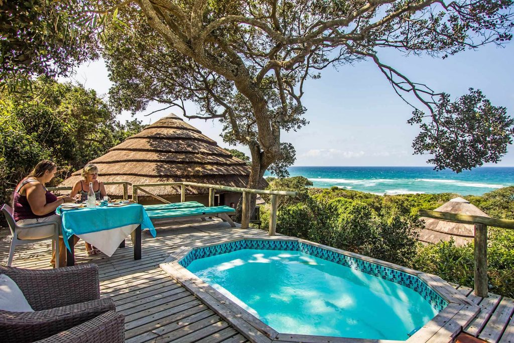 Thonga Beach Lodge's guest enjoying a meal overlooking the pool and ocean view on offer at this Isibindi Africa lodge located situtated within the iSimangaliso World Heritage Park near the Indian Ocean, Kzn South Africa.