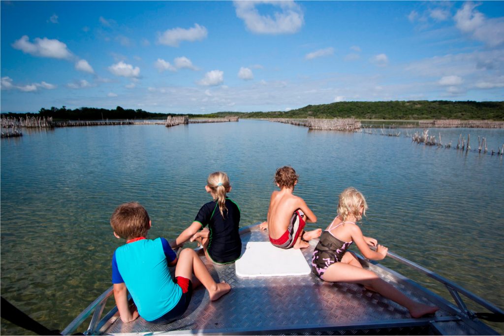 Children at traditional fishing sites at our South African Safari Lodge Kosi Forest Lodge for holiday specials package.