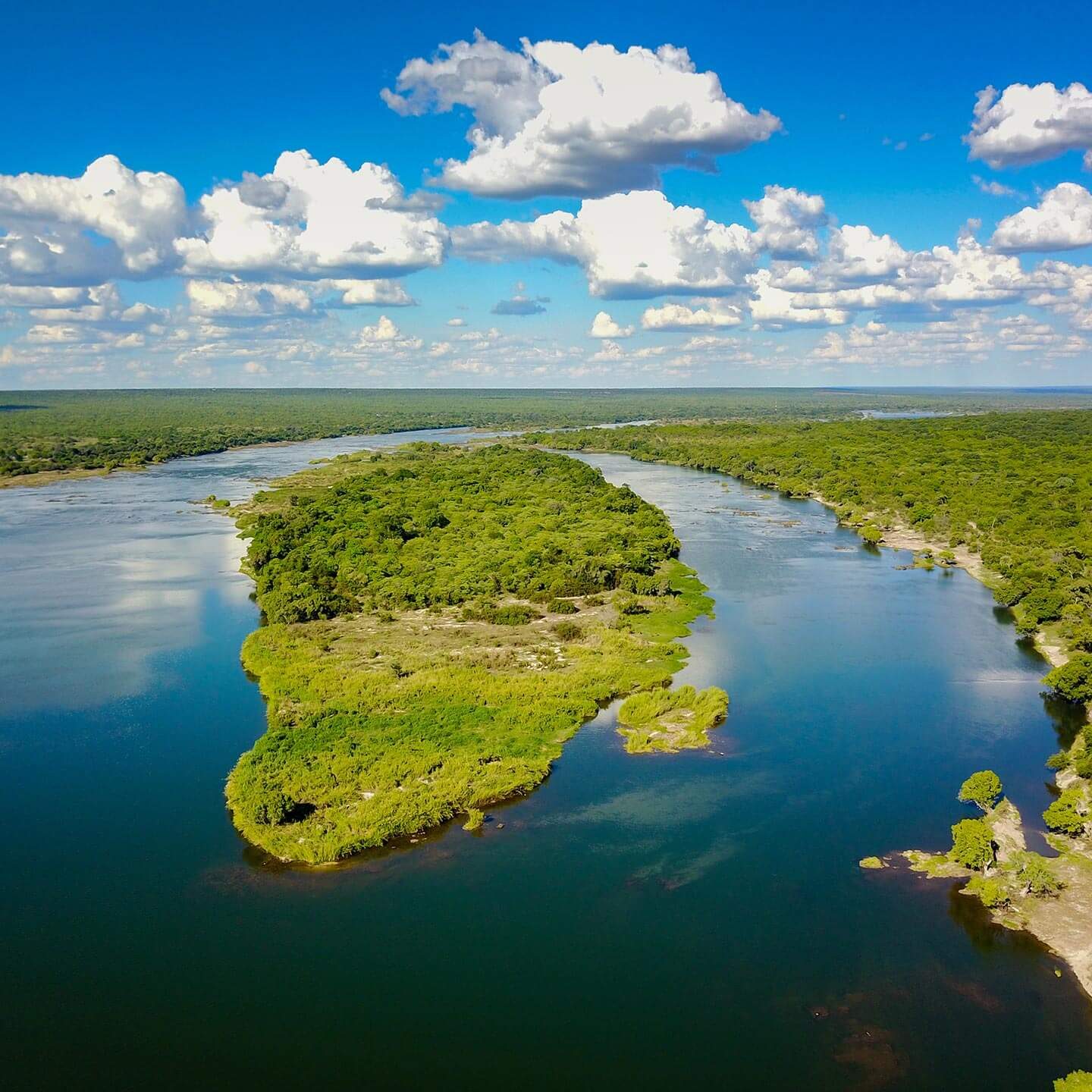 Areial shot of the Isibindi Africa Lodge Tsowa Safari Island, found in the middle of the Zambezi River near Victoria Falls.