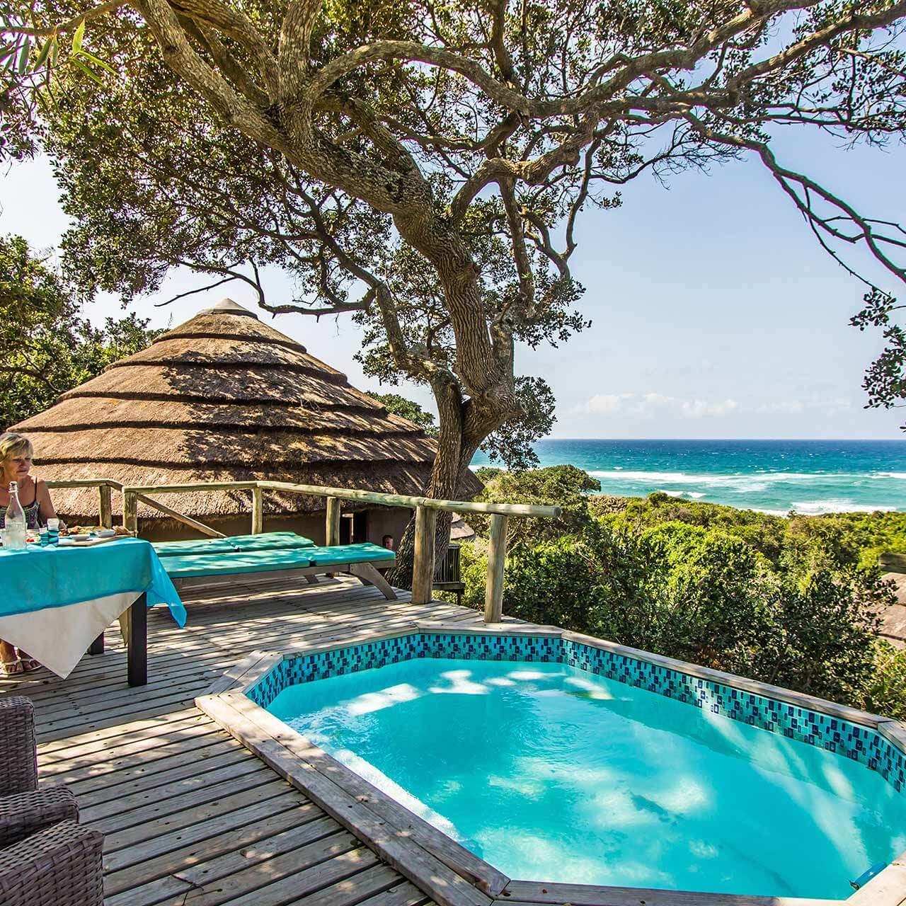 Thonga Beach Lodge's guest enjoying a meal overlooking the pool and ocean view on offer at this Isibindi Africa lodge located situtated within the iSimangaliso World Heritage Park near the Indian Ocean, Kzn South Africa.